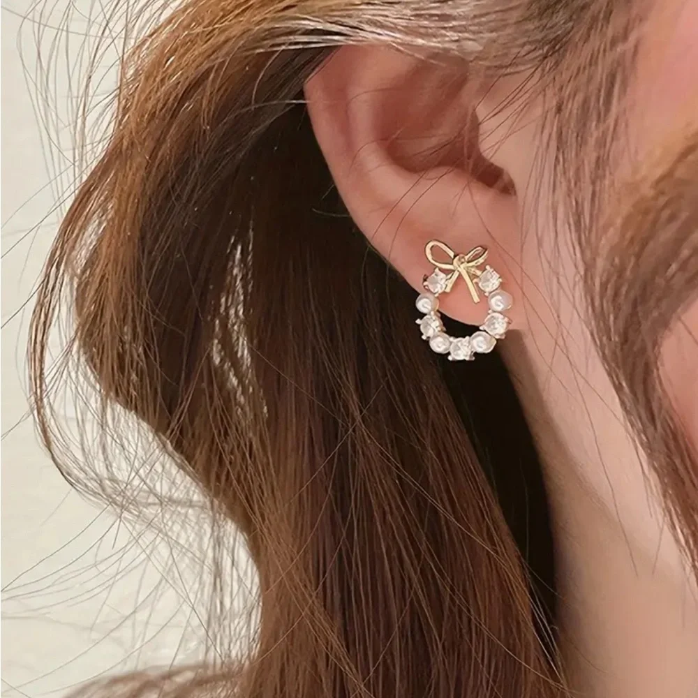 Gold Wreath With Bow Design Stud Earrings